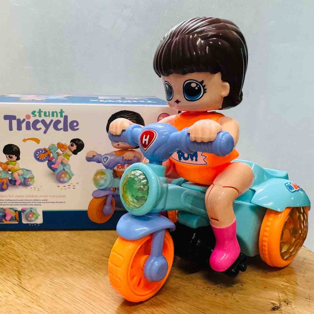 360 Degree Rotating Stunt Electric Tricycle Toy for Kids with Light and Sound