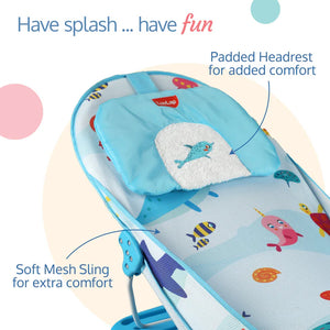 Light blue Luvlap Baby Bather with a mesh seat featuring colorful sea animal designs including an octopus, shark, narwhal, and a dolphin on the headrest. Ideal for comfortable and safe infant bathing. From uSmile.toys." www.usmile.toys