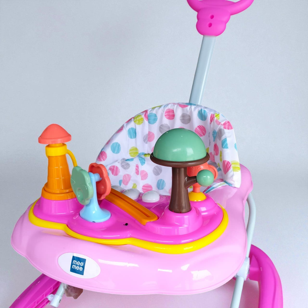 "Vibrant pink MeeMee Baby Walker with an interactive toy tray and adjustable push handle, perfect for babies 9+ months learning to walk and supporting early mobility. Usmile Toys."