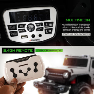 Grey and black battery operated kids jeep ride-on car with orange accents, features working headlights, overhead lights, and underbody glow, on rocky terrain." www.usmile.toys