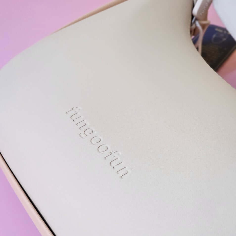 Product with 'fugoo' branding on a light pink background