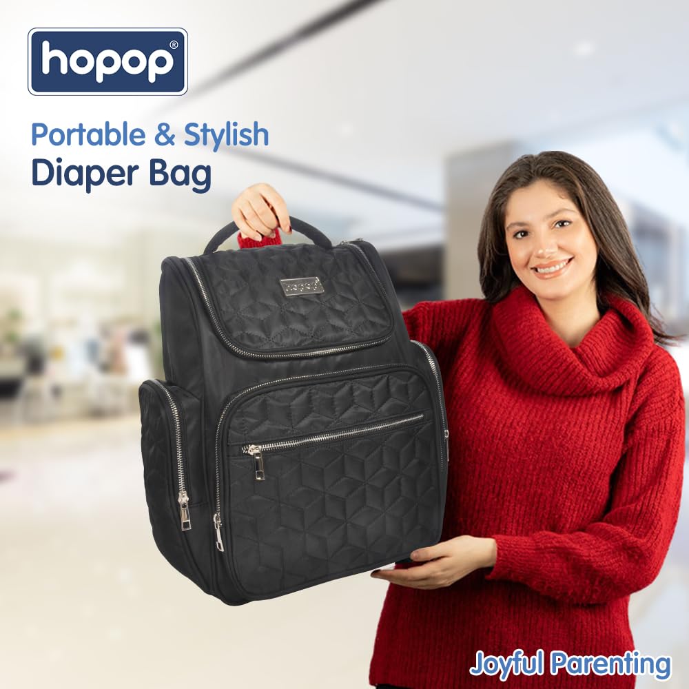 Usmile Toys Hopop black baby changing bag, spacious and durable, with side pockets for bottles. www.usmile.toys