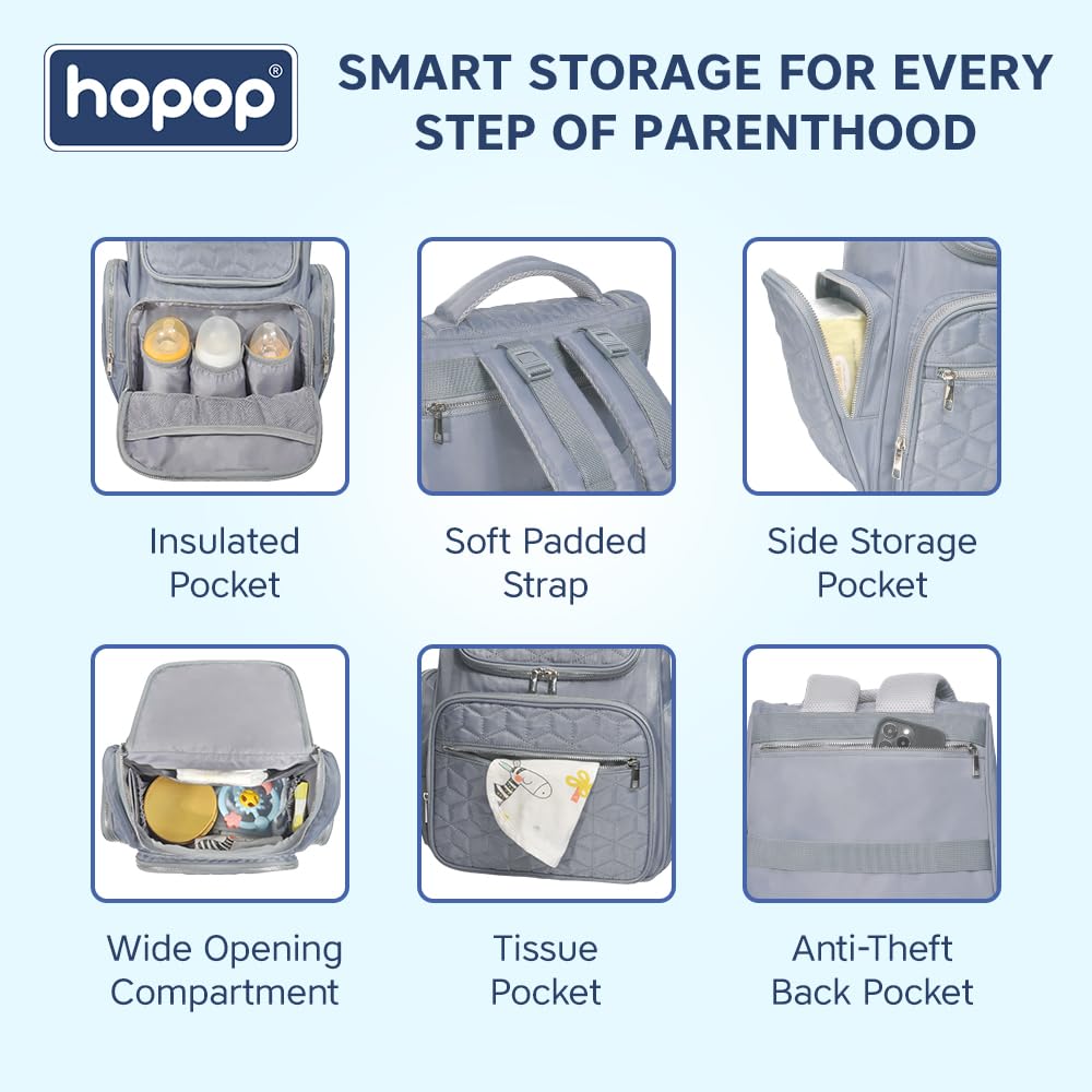 Front view of a black geometric quilted pattern diaper backpack with silver zippers and a subtle brand tag. www.usmile.toys