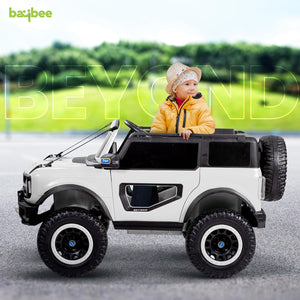 White battery operated kids jeep ride-on toy car with black accents, featuring bright LED headlights, roof lights, and music, suitable for children's play." www.usmile.toys