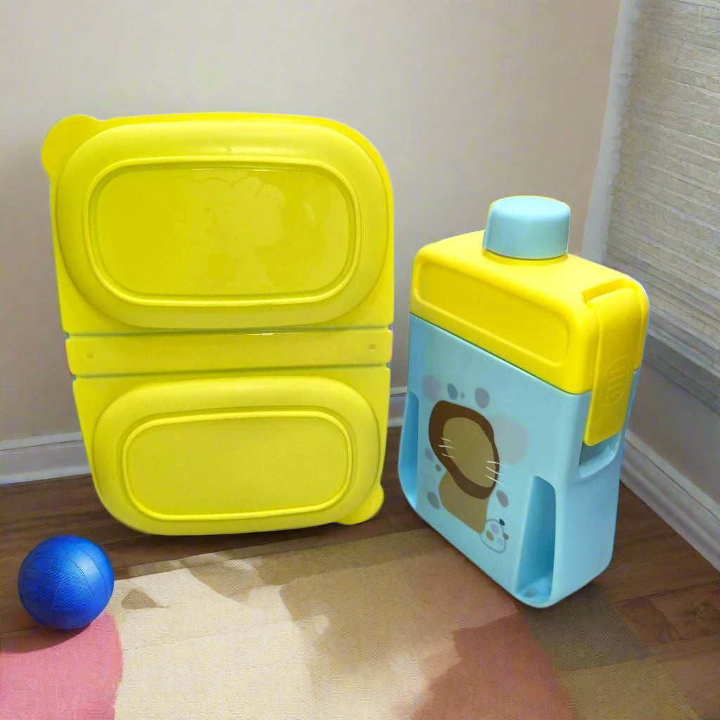 Yellow kids lunch box and matching blue and yellow water bottle combo. www.usmile.toys