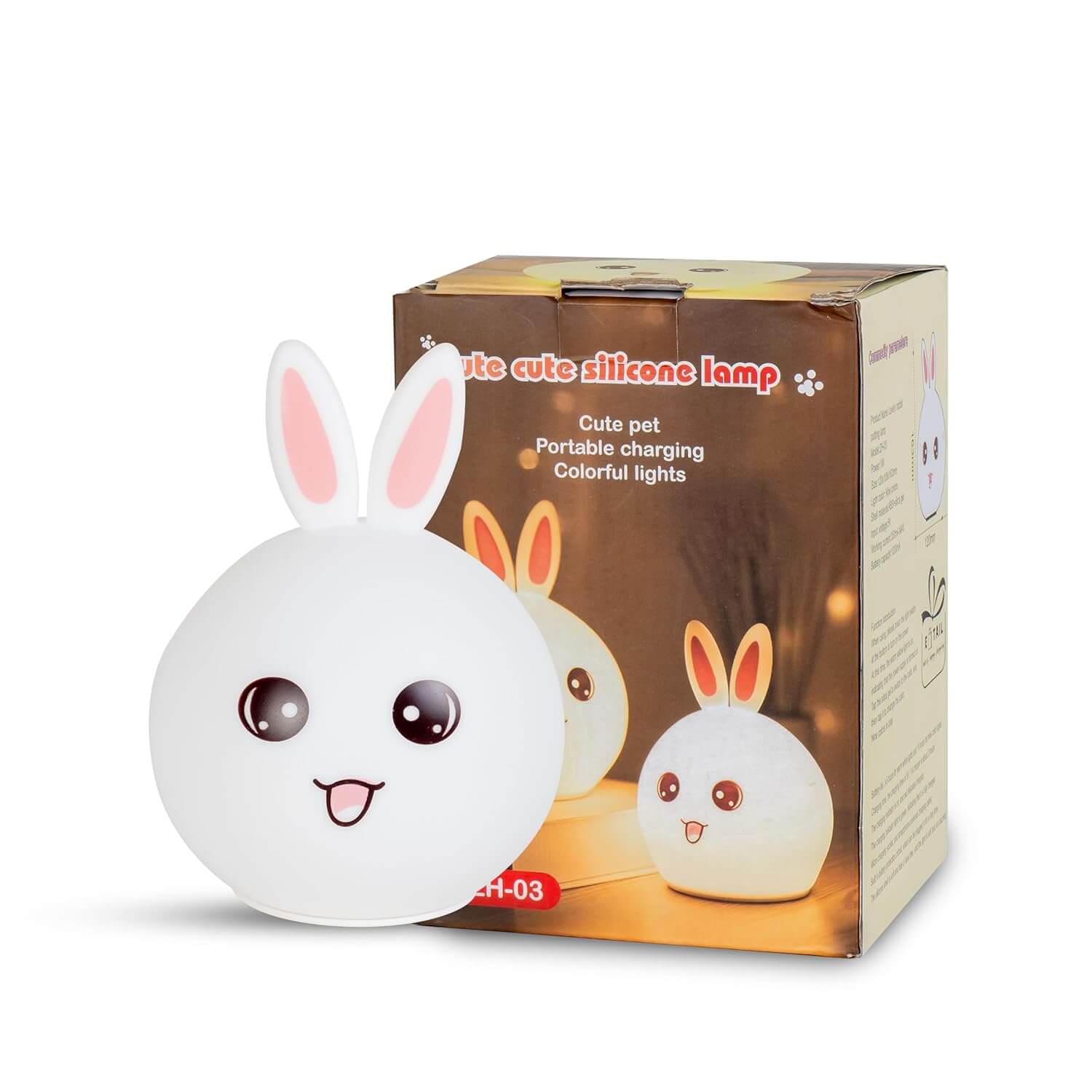 Cute white silicone rabbit night light with pink ears and an adorable face, glowing softly. In the background, two more rabbit lamps glow blue and orange, showcasing the color-changing feature. Perfect as a bedside lamp or nursery decor for kids and adults, providing comforting illumination. www.usmile.com