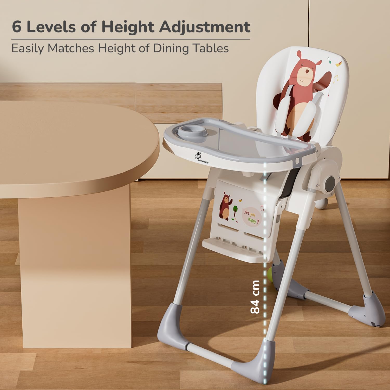 White and grey Marshmallow Lite baby high chair with 6 adjustable height levels, comfortable and secure for infant feeding, featuring a playful bear motif. www.usmile.toys