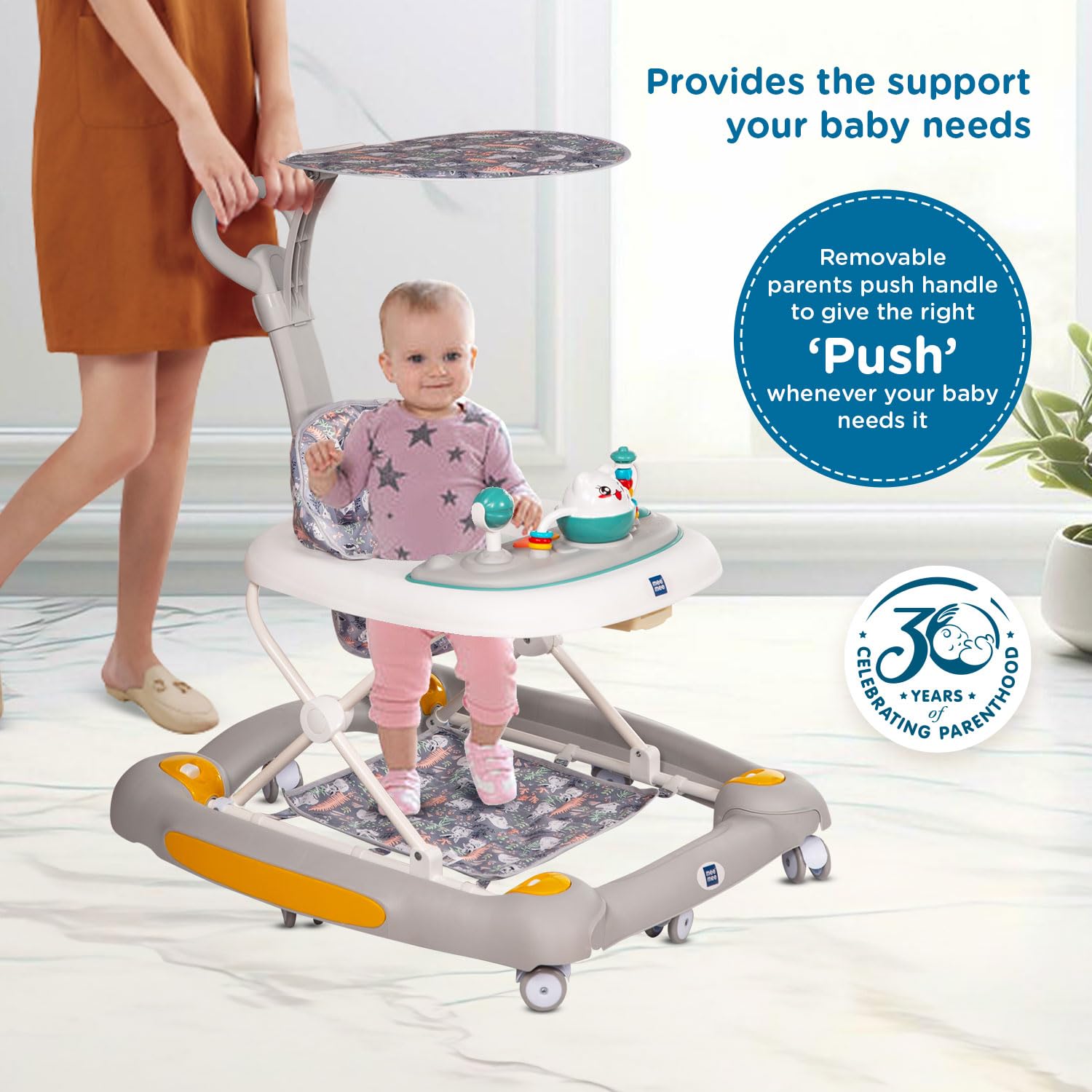 Grey and white Mee Mee baby walker with removable padded seat, adjustable height, and toy tray for infants.
www.usmile.toys