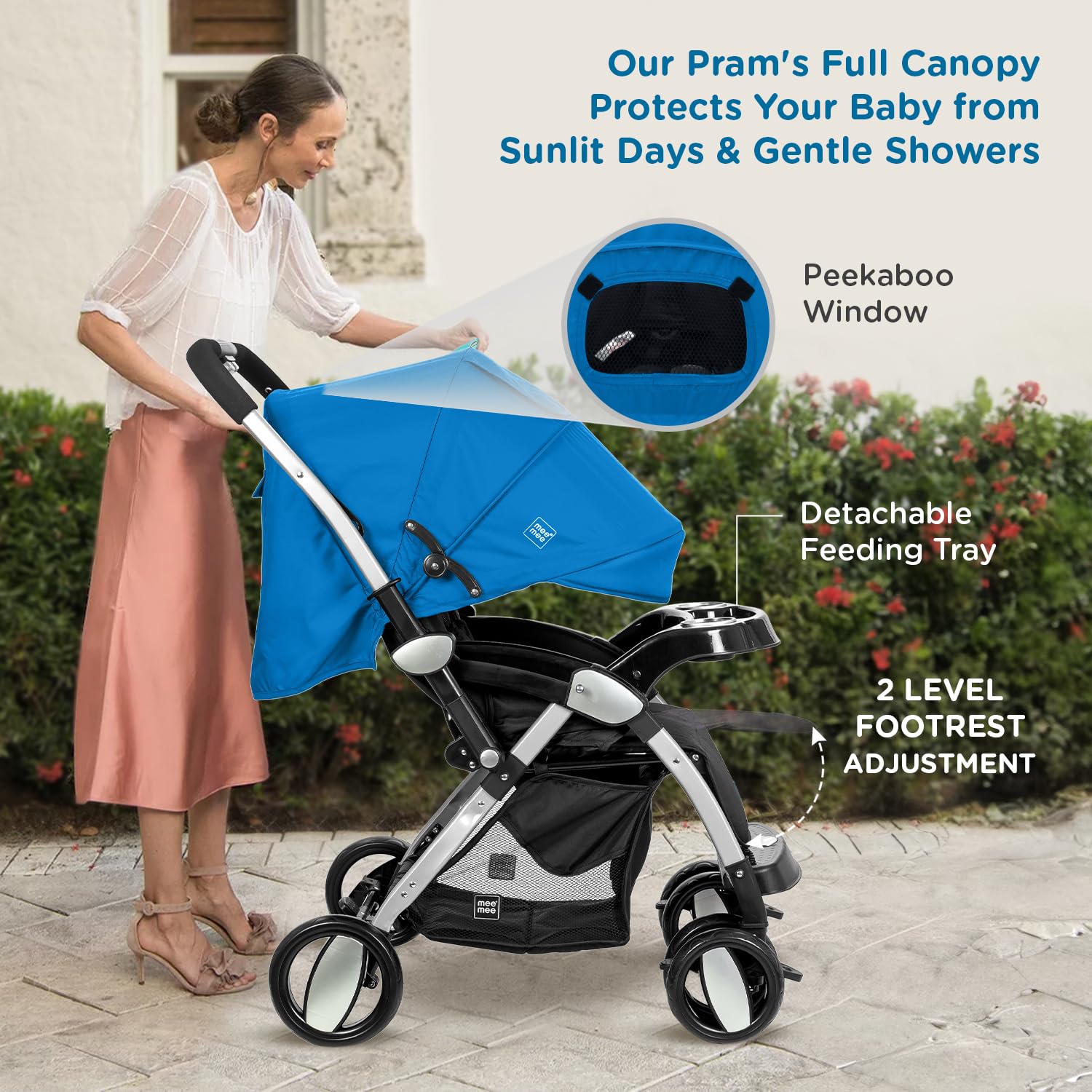Teal and black modern baby stroller with silver frame, large wheels, and front tray, positioned indoors on a wooden floor. www.usmile.toys