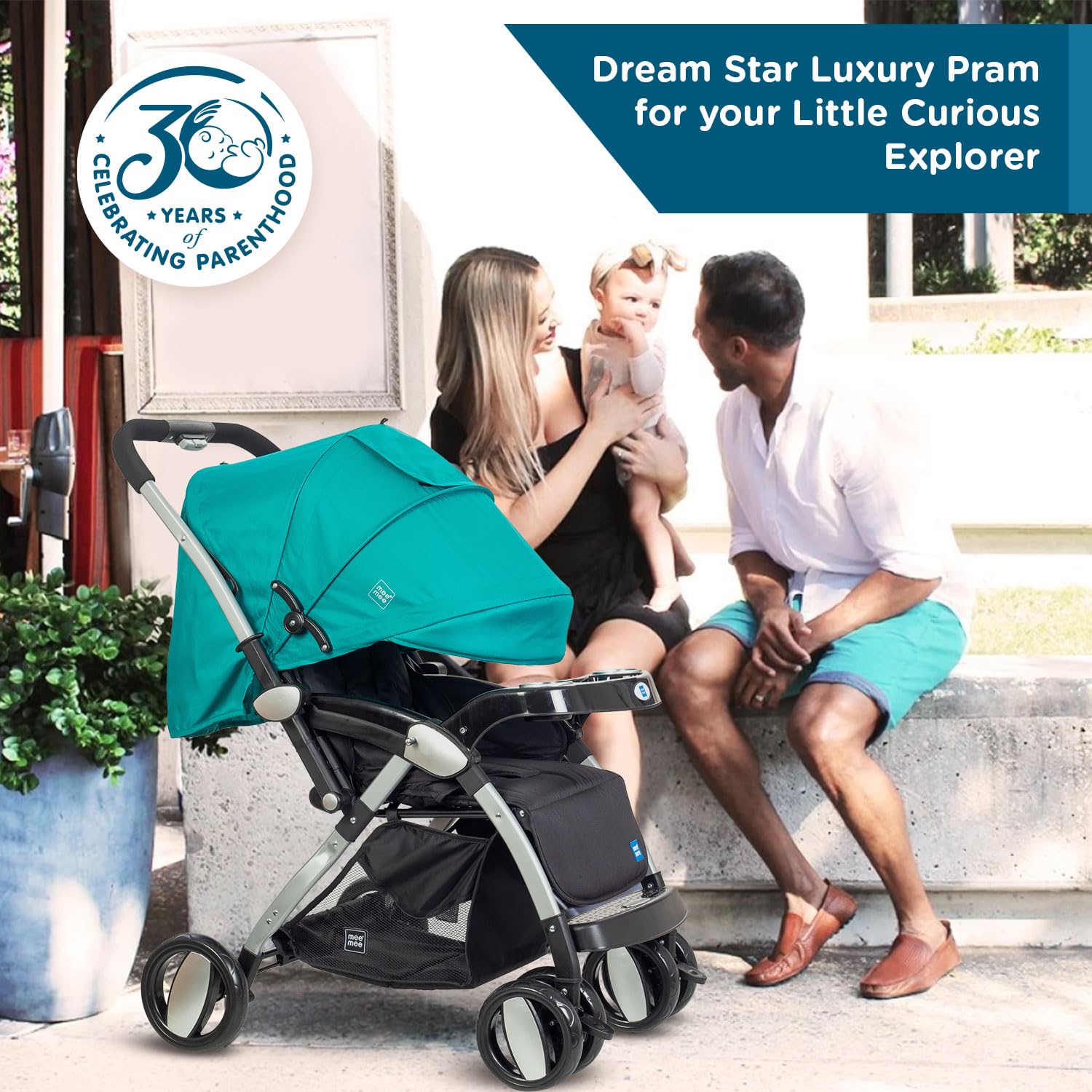 Luxury baby pram in teal and black, featuring a reversible handle, multi-position recline, and storage basket. www.usmile.toys
