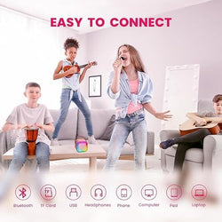 Kids' mini karaoke system with a white square LED Bluetooth speaker and a small matching handheld microphone for singing. www.usmile.toys