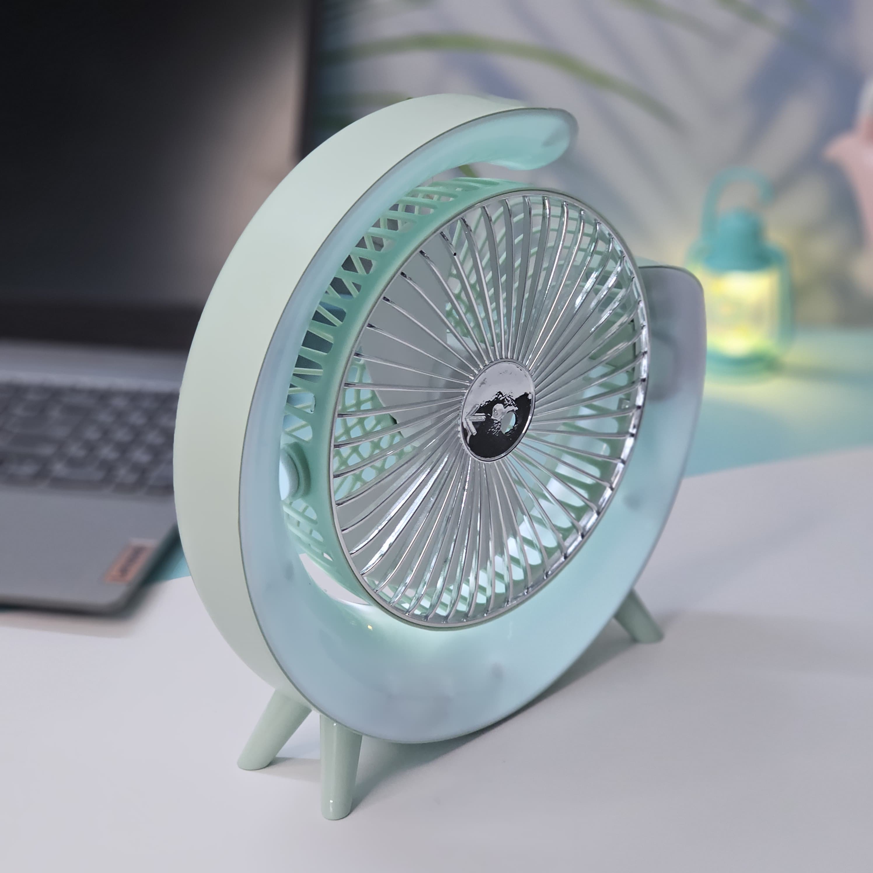 "Stylish and functional: a Usmile Toys moon-shaped portable desk fan with LED, ideal for adding both cool air and ambient light to any workspace or bedside table." www.usmile.toys