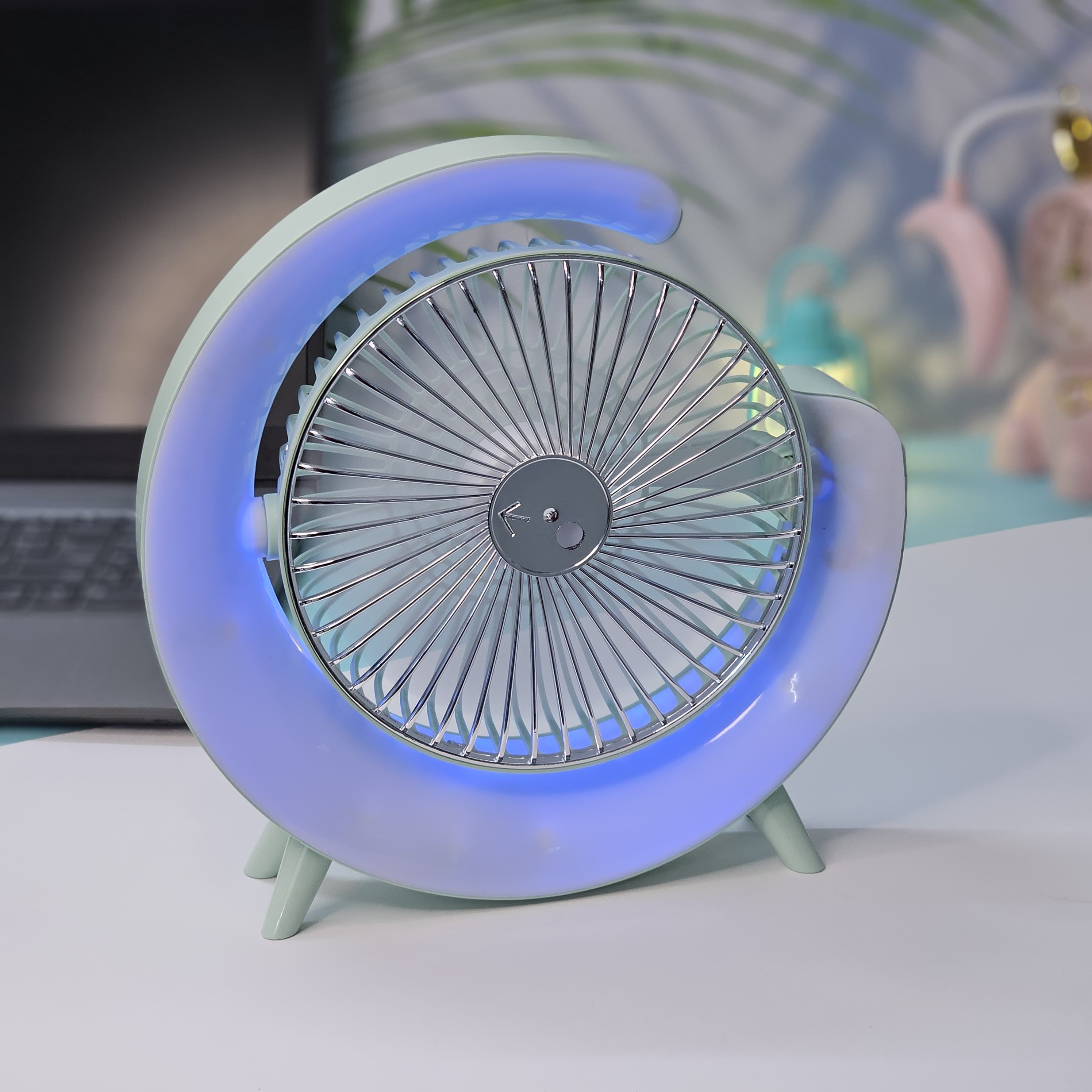 "Stylish and functional: a Usmile Toys moon-shaped portable desk fan with LED, ideal for adding both cool air and ambient light to any workspace or bedside table." www.usmile.toys