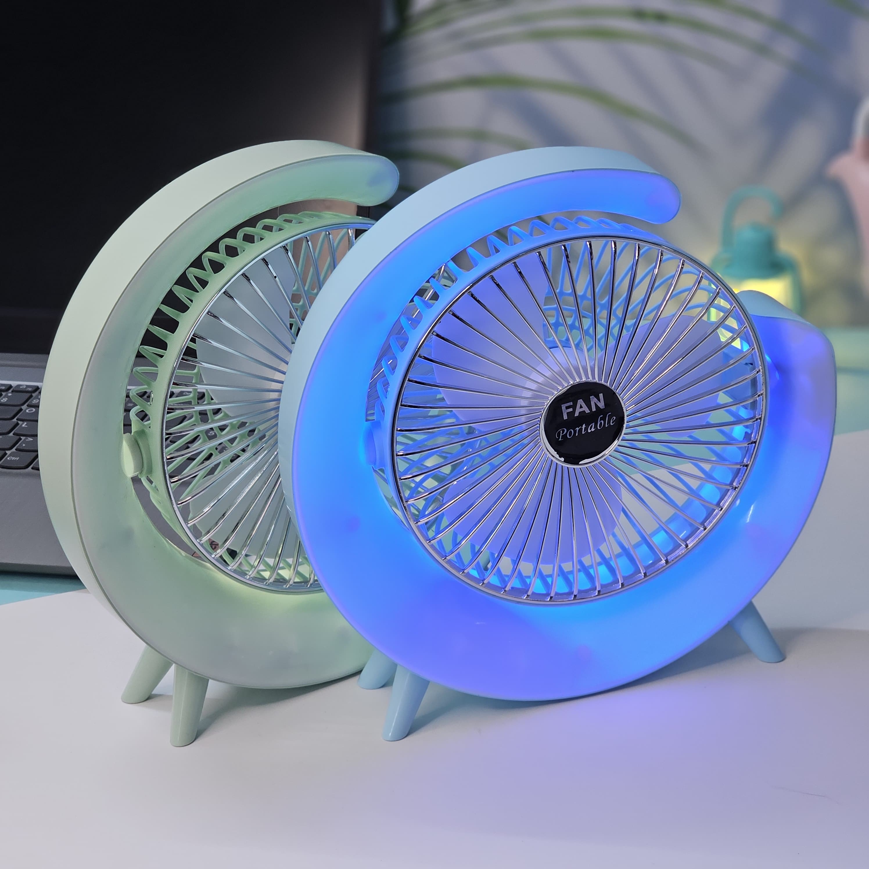"Usmile Toys modern mini fan: a sleek, crescent moon-shaped desk fan with built-in LED lighting, providing powerful airflow for home or office."
