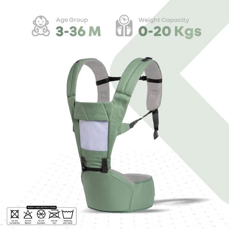 Happy mother carrying her baby in a green R For Rabbit Upsy Daisy 4-in-1 Baby Carrier with ergonomic design, suitable for multiple carrying positions. Shows a baby facing outwards, securely strapped. From uSmile.toys." www.usmile.toys