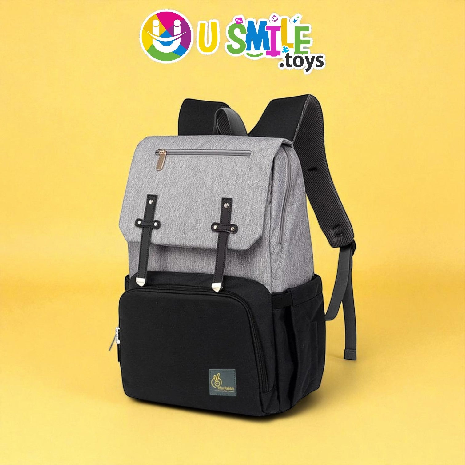 Gray and black backpack on a yellow background with U Smile toys logo.