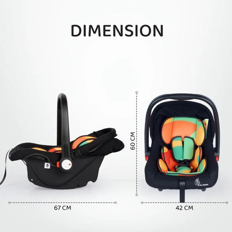 Black R For Rabbit Picabo 4-in-1 Baby Carrycot and Car Seat with vibrant orange and green padded interior, a sturdy handle, and a protective canopy. Designed for safe infant travel and comfort. From uSmile.toys.