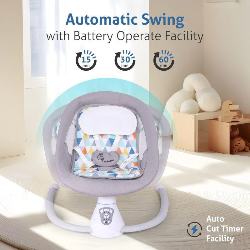 Modern grey Cocoon Smart Auto Baby Swing with a comfortable patterned seat, protective mesh canopy, and dangling toys to engage infants. Designed for soothing motion and hands-free comfort. From uSmile.toys." www.usmile.toys