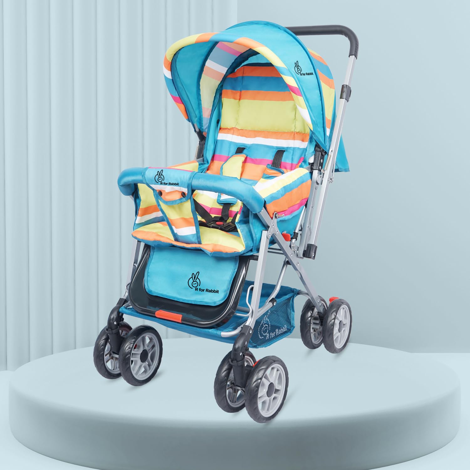 Lightweight R for Rabbit baby pram in blue and yellow stripes, featuring a padded seat, safety harness, and large wheels. www.usmile.toys