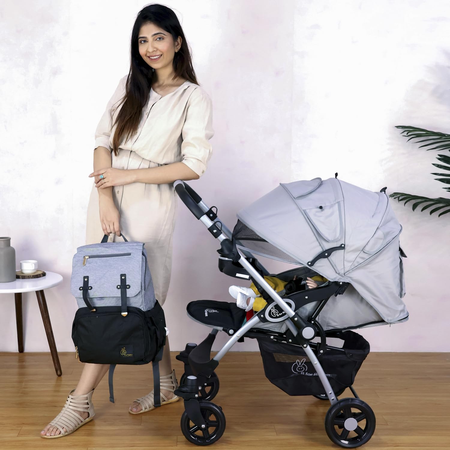 Black and grey R for Rabbit Chocolate Ride baby travel system, including a stroller and infant car seat, designed for newborns and toddlers." www.usmile.toys