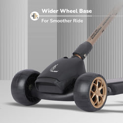 "The R for Rabbit Road Runner Blaze, a premium foldable 3-wheel kick scooter for children, presented in a sleek dark grey with stylish gold wheel accents. This scooter boasts durable PU LED light-up wheels, 4  adjustable height levels to grow with your child, and integrated light & music features for an enhanced riding experience. Available at Usmile Toys." www.usmile toys