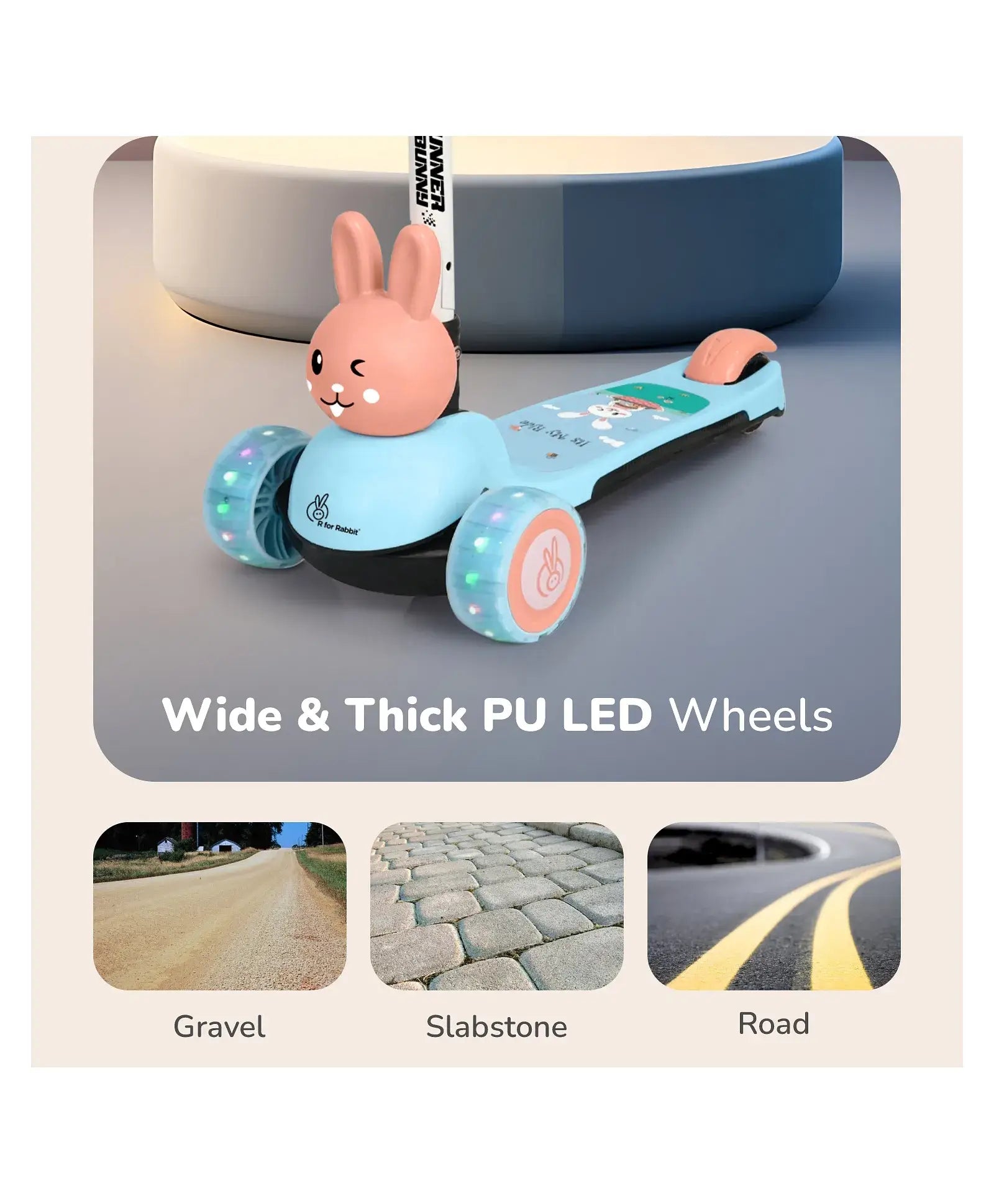 Children's scooter with rabbit design and LED wheels, shown on a road surface.