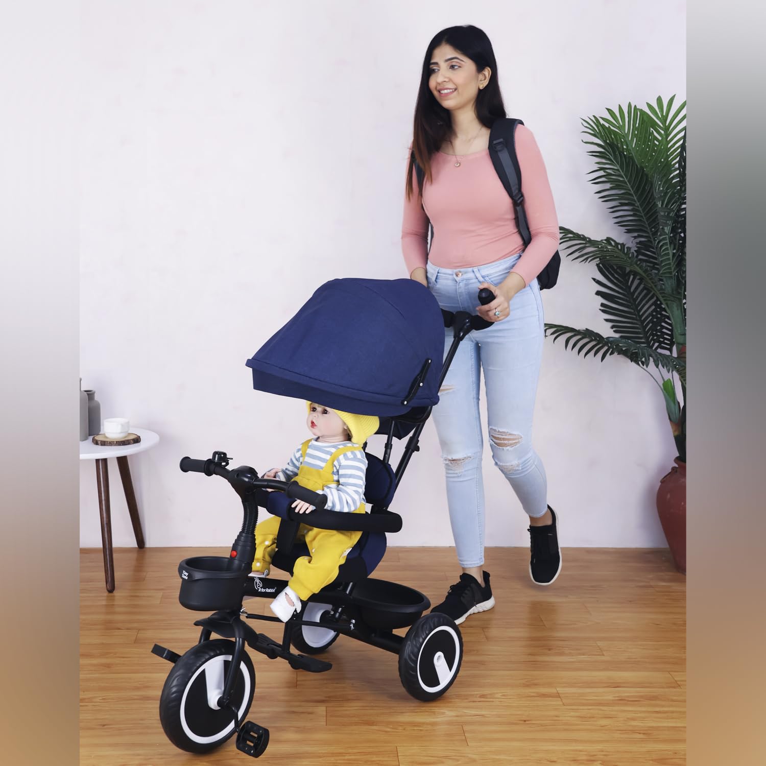 Comfortable and safe dark blue kids' tricycle with sunshade, perfect for outdoor adventures and parental control. www.usmile.toys