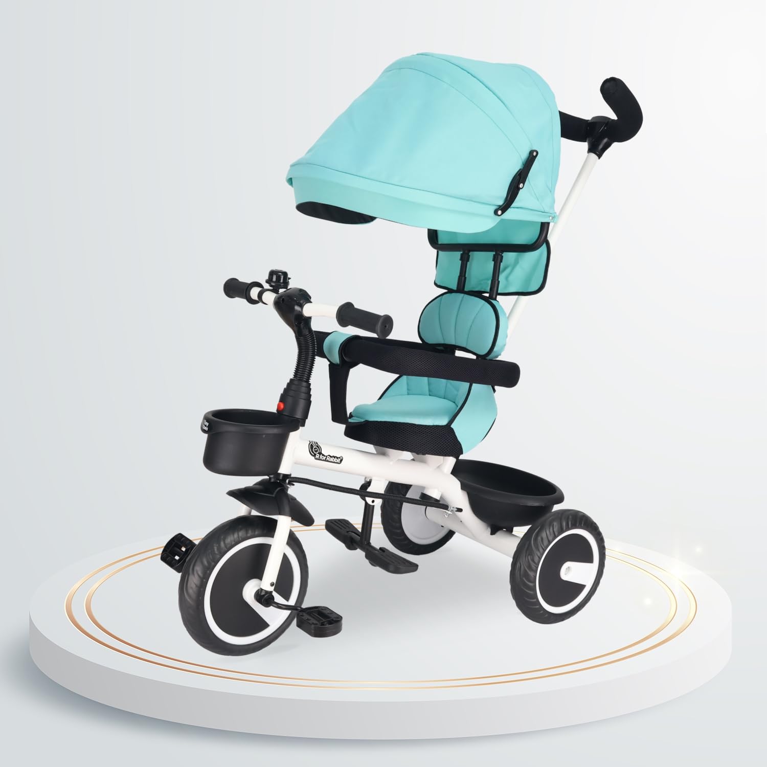 Navy blue and black kids' tricycle on a white pedestal, featuring a large sun canopy, parent handle, and front basket. www.usmile.toys