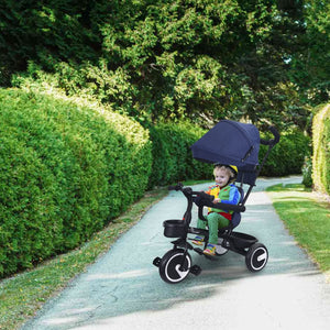 Comfortable and safe dark blue kids' tricycle with sunshade, perfect for outdoor adventures and parental control.www.usmile.toys