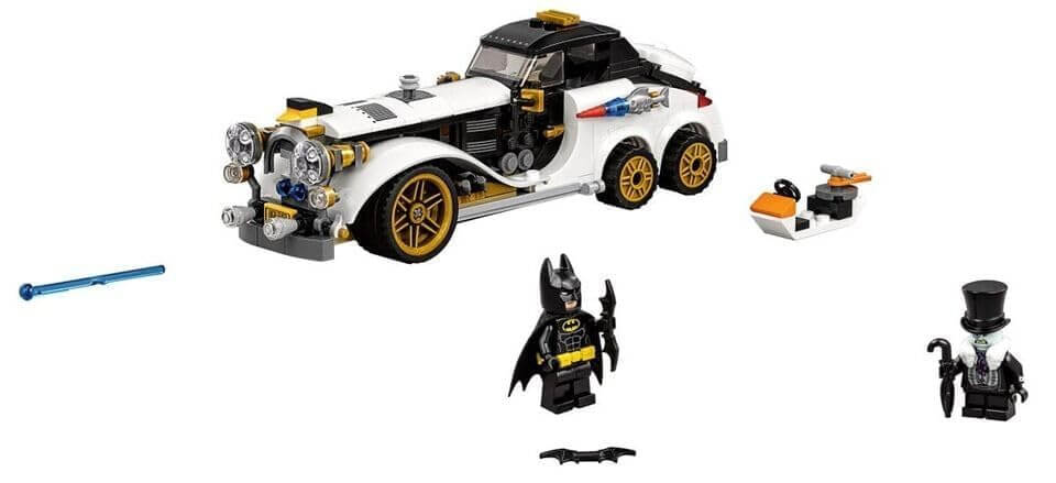 Kids' multicolor building block set for creative play, including a white vintage-style car and a Batman minifigure for imaginative superhero battles. www.usmile.toys