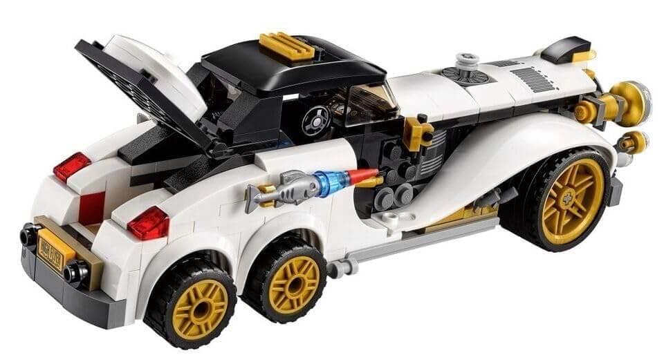 Kids' multicolor building block set for creative play, including a white vintage-style car and a Batman minifigure for imaginative superhero battles. www.usmile.toys 