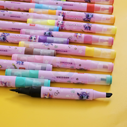 "24-piece Unicorn Color Marker Set by Yoyo & Zozo, displayed in a clear plastic case with pink accents. www.usmile.toys