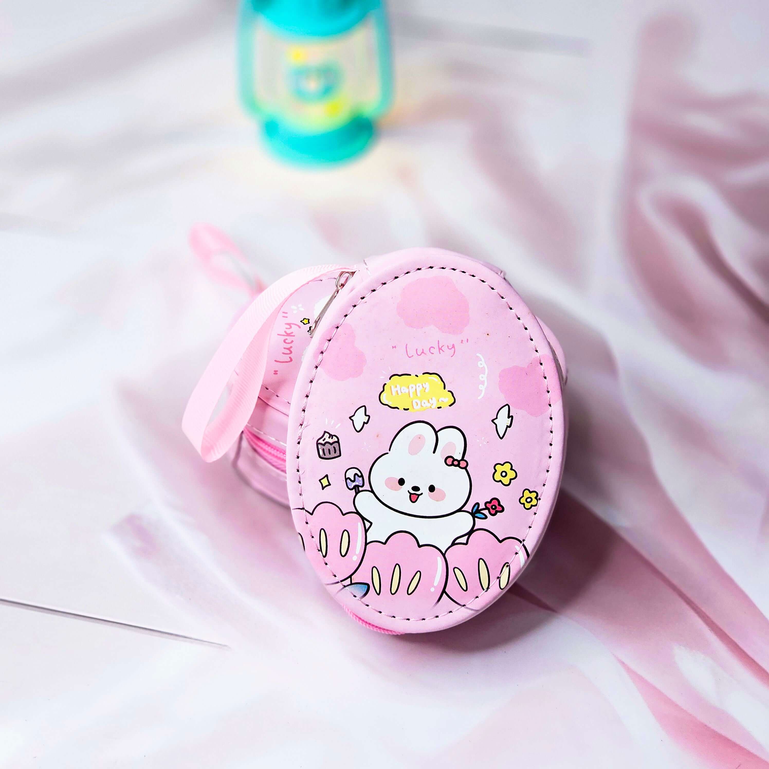 Six colorful cute cartoon oval mini zipper pouches with bear, bunny, duck, cake, and cloud designs, perfect for coins, earphones, and small accessories