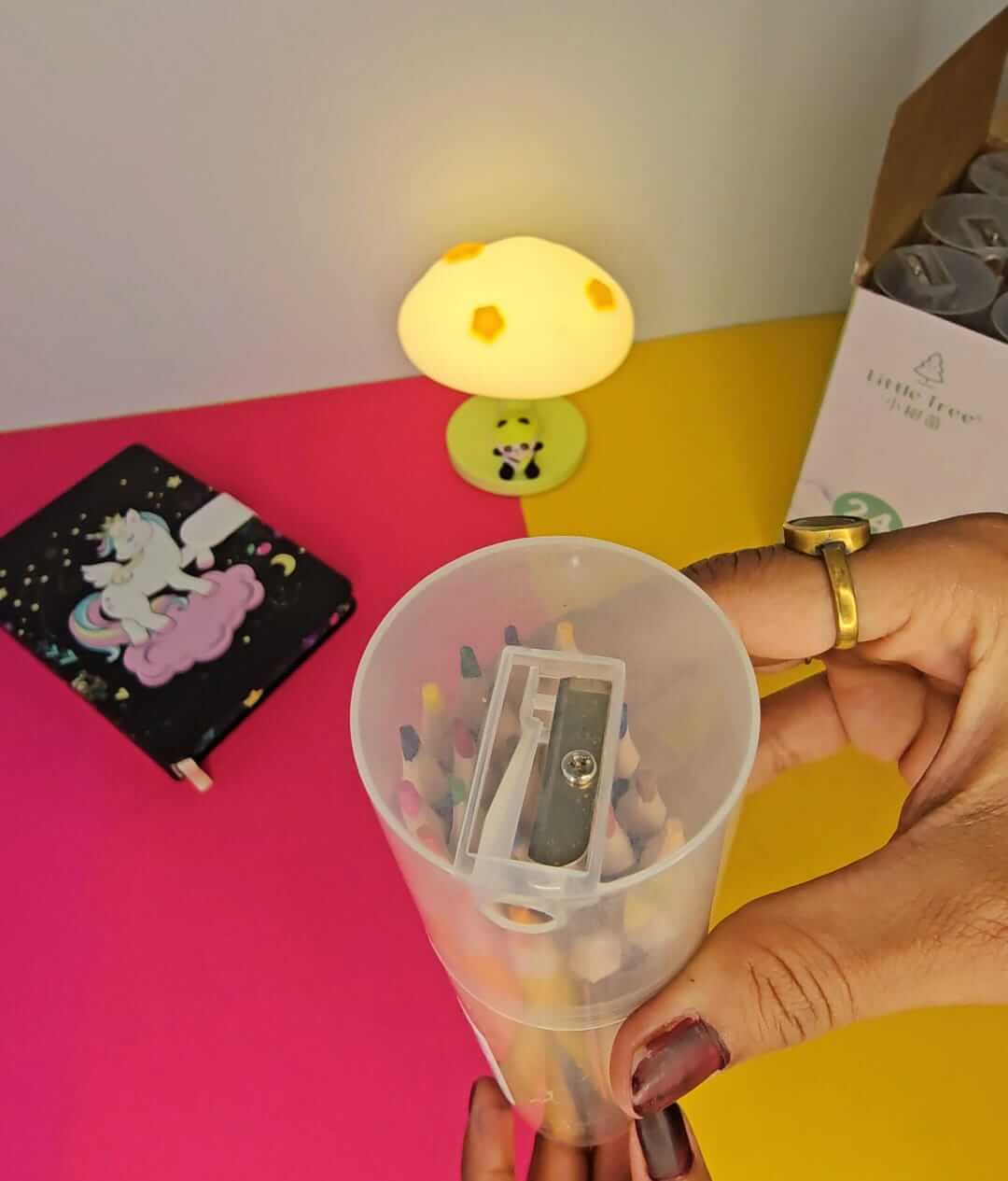 Collection of high-quality erasable art pencils in a convenient storage box, adorned with a playful unicorn illustration, ideal for school stationery and creative fun from Usmile Toys.