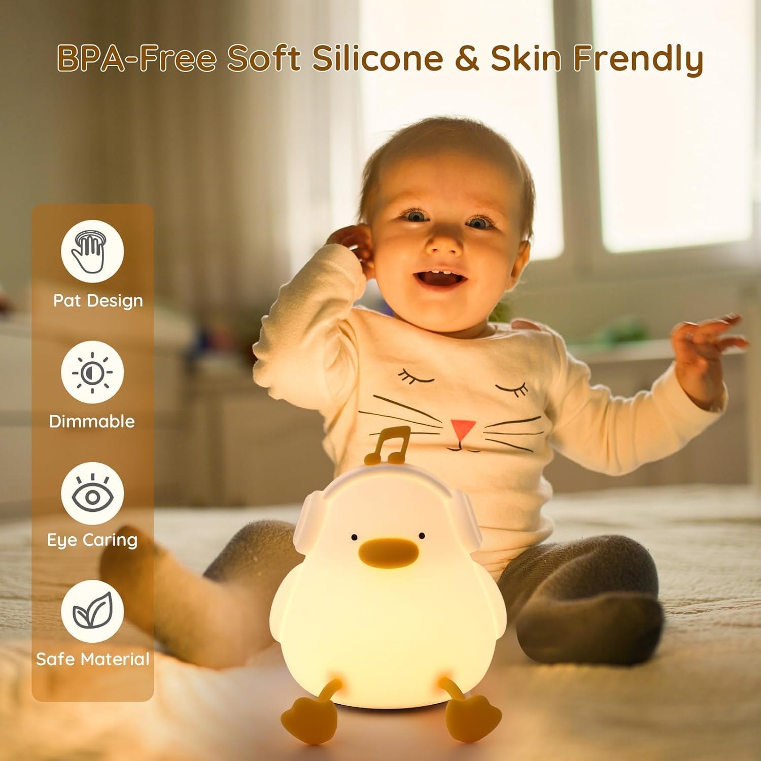 Adorable glowing white silicone night lamp for kids, shaped like a sitting duck wearing headphones with a music note accent. Provides a soft, comforting light. From uSmile.toys. www.usmile.toys
