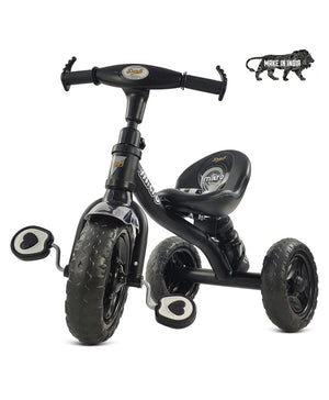 Black tricycle for children aged 3 to 5 years, with a sturdy frame and comfortable seat, in an urban setting. www.usmile.toys