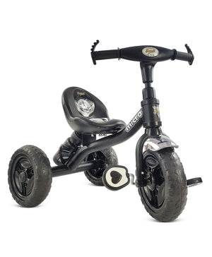 Black tricycle for children aged 3 to 5 years, with a sturdy frame and comfortable seat, in an urban setting. www.usmile.toys