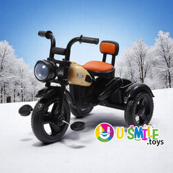 Ride Himalayan Kids Musical Tricycle in black and beige with an orange seat, designed in a motorcycle style. www.usmile.toys