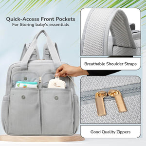Gray diaper bag with quick-access front pockets and breathable shoulder straps on a light blue background.