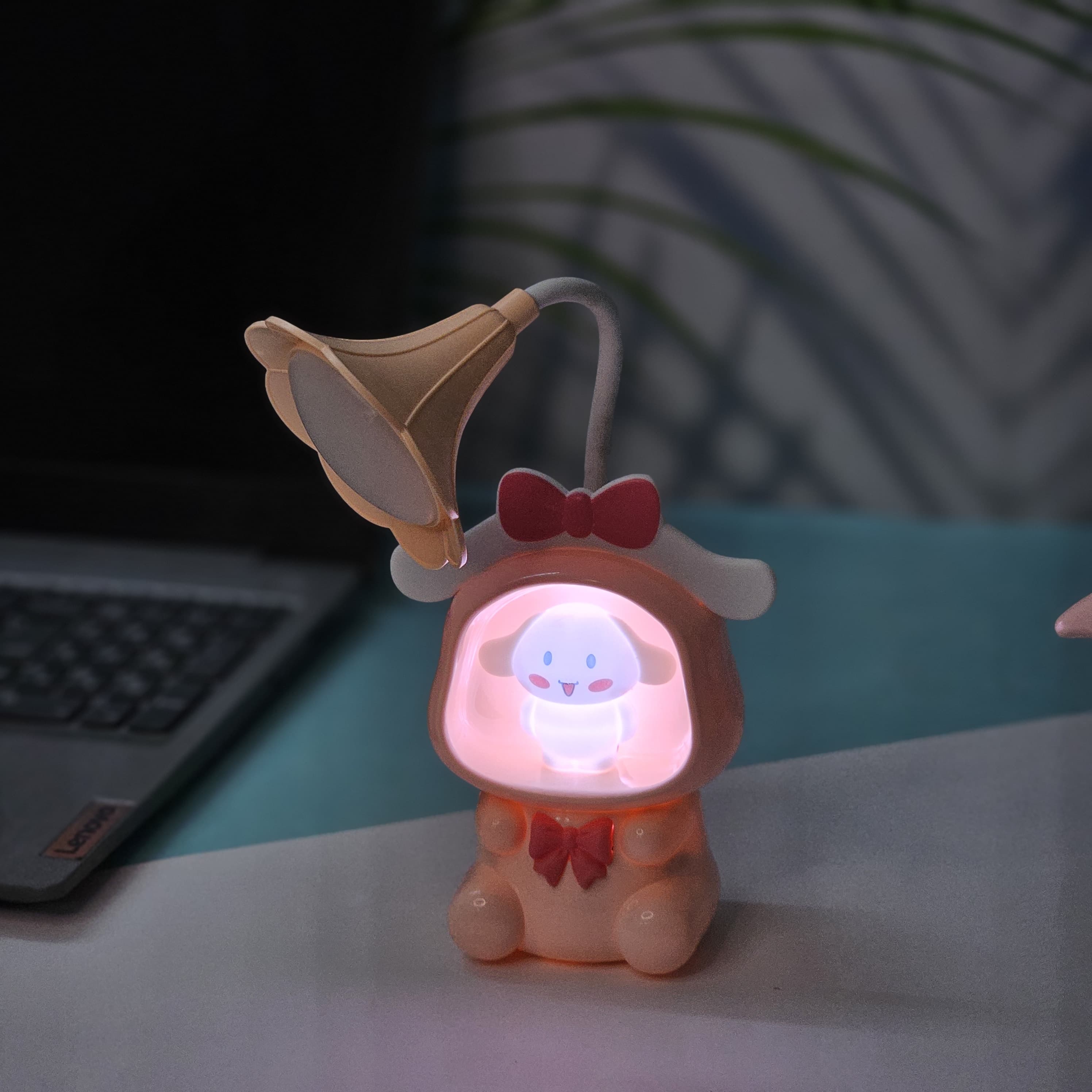 Set of three Usmile Toys Astronaut Teddy Lamps in blue, pink, and green, each featuring a glowing flower-shaped light and a base designed as a convenient pencil holder.
