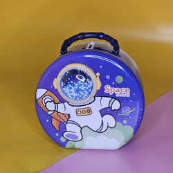 Space-Themed Metal Money Box with Lock & Key – Cute Astronaut & UFO Design Piggy Bank for Kids | Secure & Durable Savings Box with Transparent Coin Window | Ideal Return Gift for Birthdays, Parties & Special Occasions | Fun & Educational Gift for Children to Learn Money-Saving Habits | Available in Multiple Colors | Shop Now at www.usmile.toys