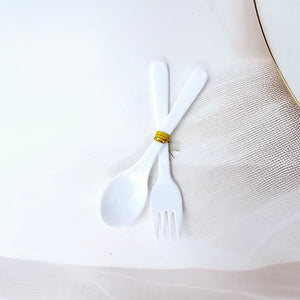 Colourful toddler mealtime set from Usmile Toys featuring a vibrant unicorn cartoon plate, matching cup, and small spoon and fork. www.usmile.toys