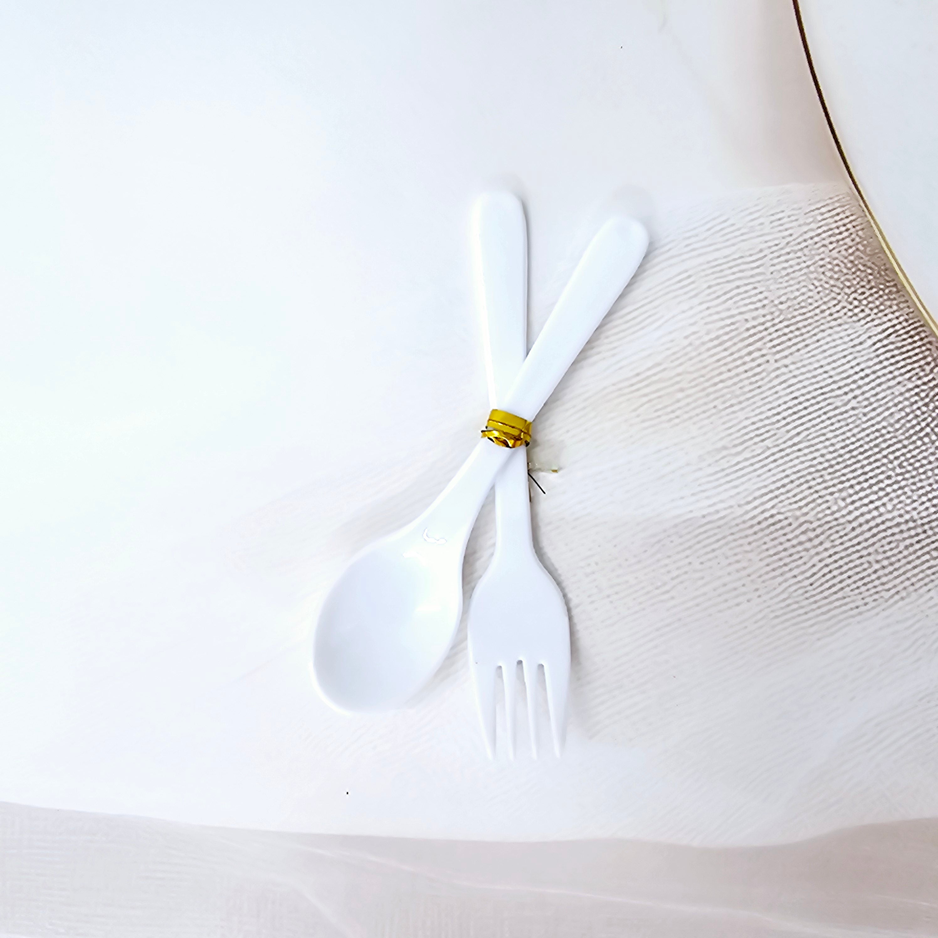 Colourful toddler mealtime set from Usmile Toys featuring a vibrant unicorn cartoon plate, matching cup, and small spoon and fork. www.usmile.toys