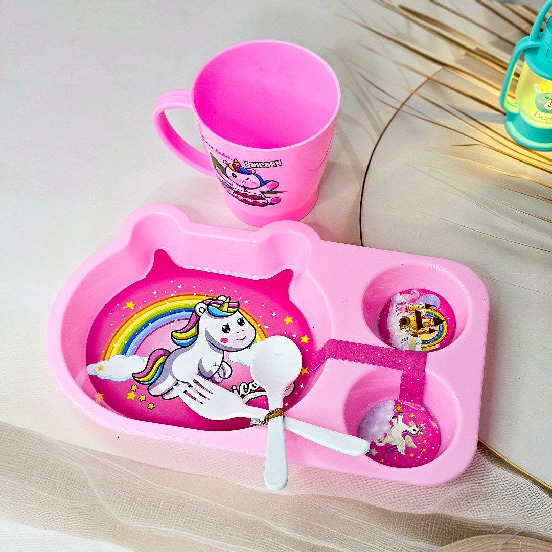 Usmile Toys playful cartoon toddler dining set in pink with a unicorn design, including a segmented plate, cup, and cutlery. www.usmile.toys