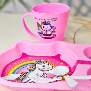 Colourful toddler mealtime set from Usmile Toys featuring a vibrant unicorn cartoon plate, matching cup, and small spoon and fork. www.usmile.toys