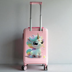 Pink suitcase with a unicorn design on a gray background