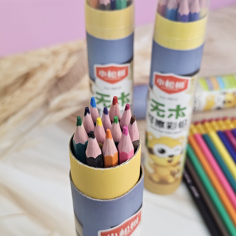 Close-up of a 12-piece pack of vibrant colored pencils, showcasing various shades, ideal for children's art and creative development from uSmile.toys.