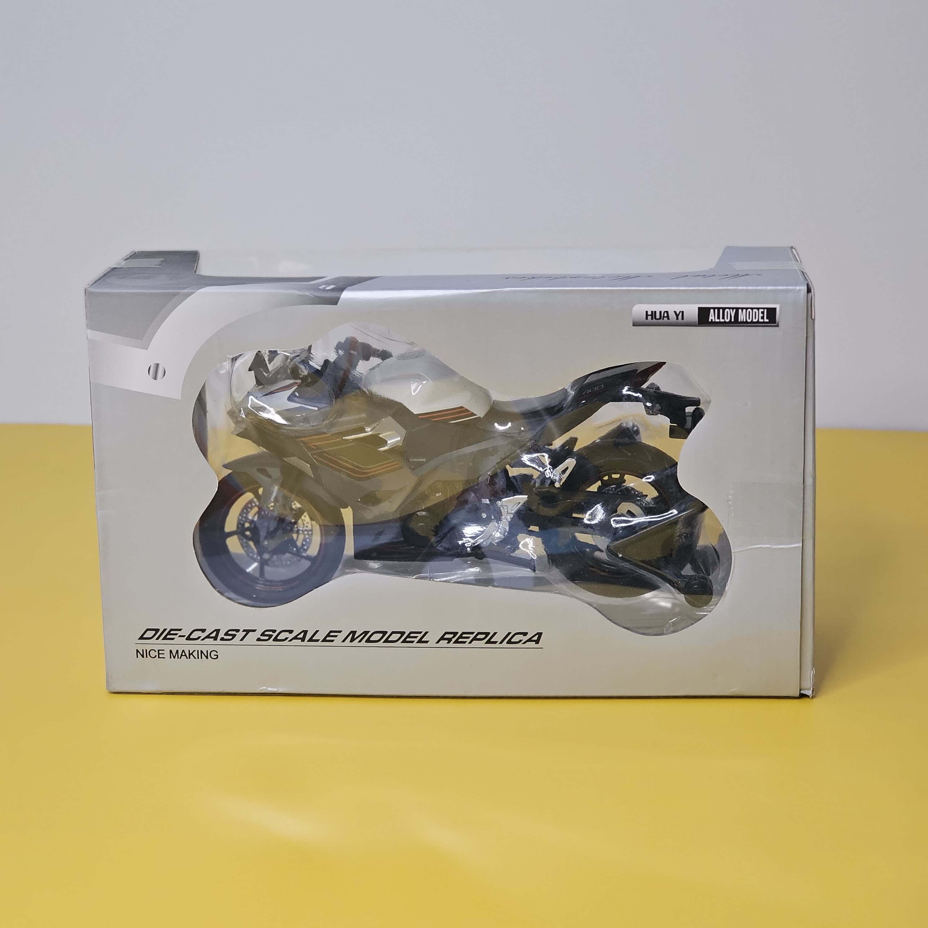 Close-up front view of a vibrant green and black toy motorbike, a die-cast model designed for kids with interactive LED lights and fun pull-back action, available at Usmile Toys.www.usmile.toys