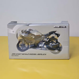 Close-up front view of a vibrant green and black toy motorbike, a die-cast model designed for kids with interactive LED lights and fun pull-back action, available at Usmile Toys.www.usmile.toys