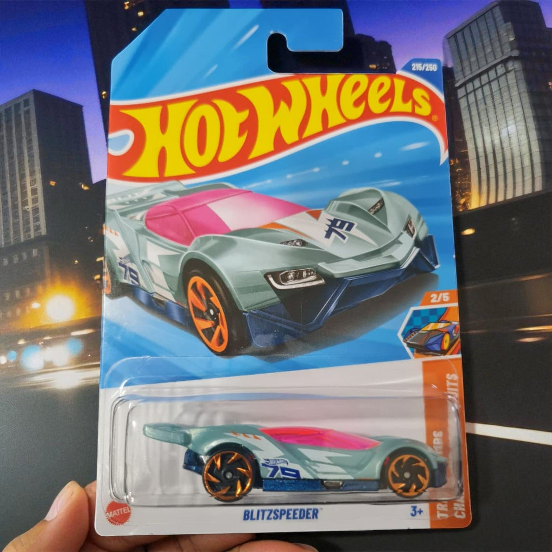 Hot Wheels toy car in packaging with cityscape background